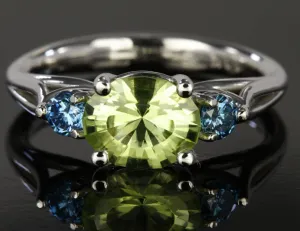14K White Gold Oval Peridot and Enhanced Blue Diamond Ring