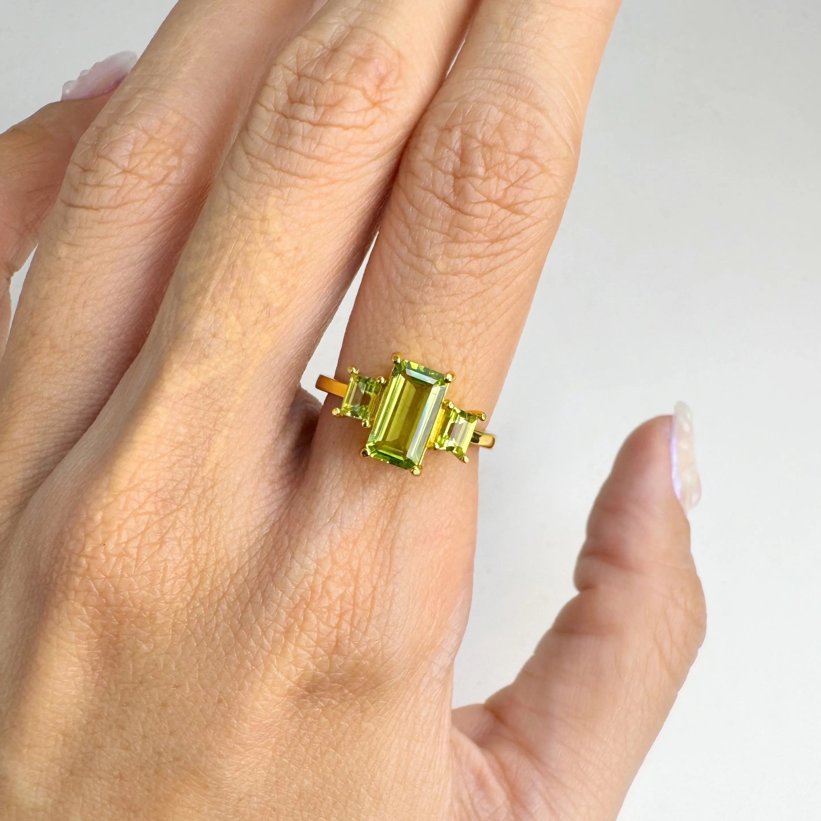 5 x 8 mm. Octagon Cut Green Pakistani Peridot Trilogy Ring