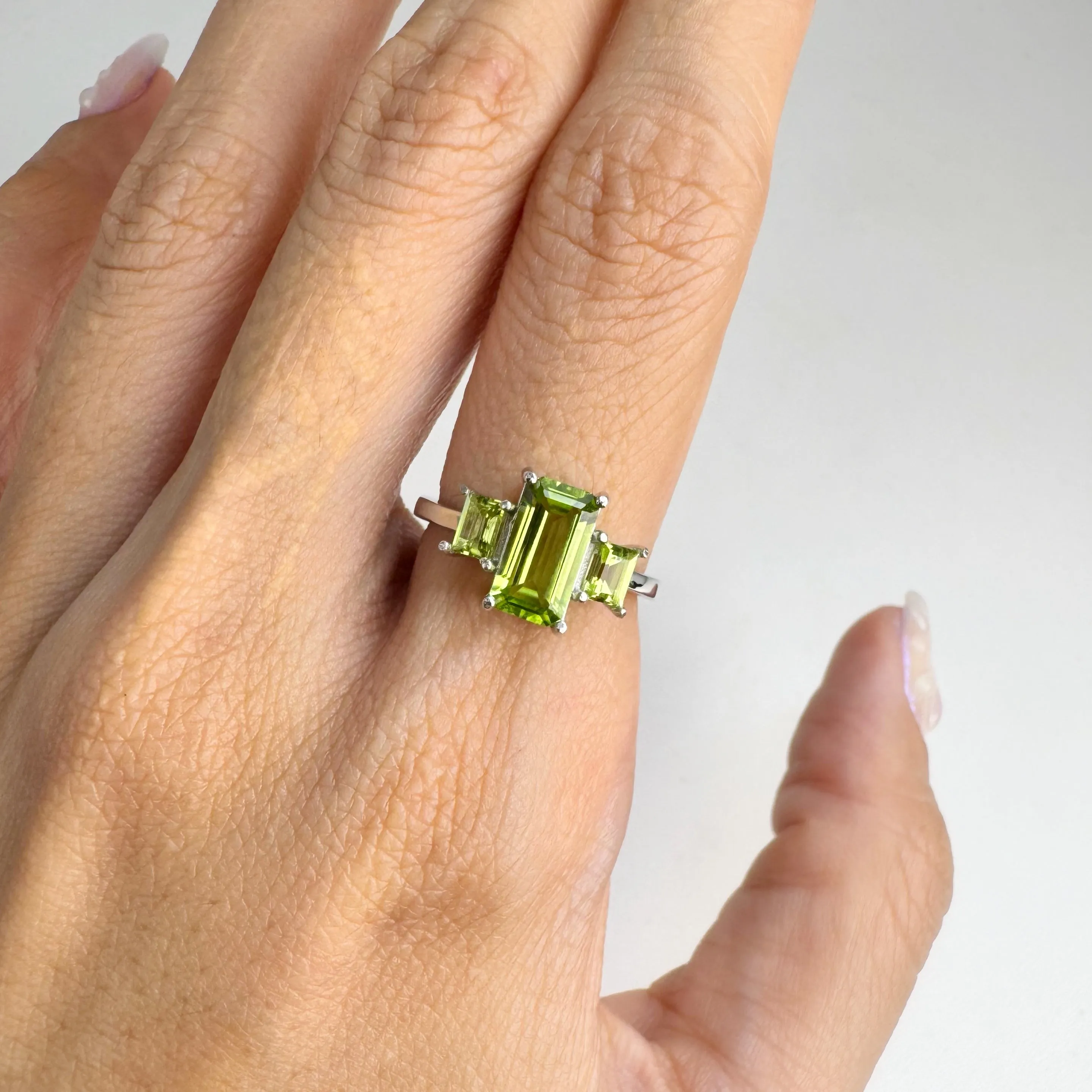 5 x 8 mm. Octagon Cut Green Pakistani Peridot Trilogy Ring