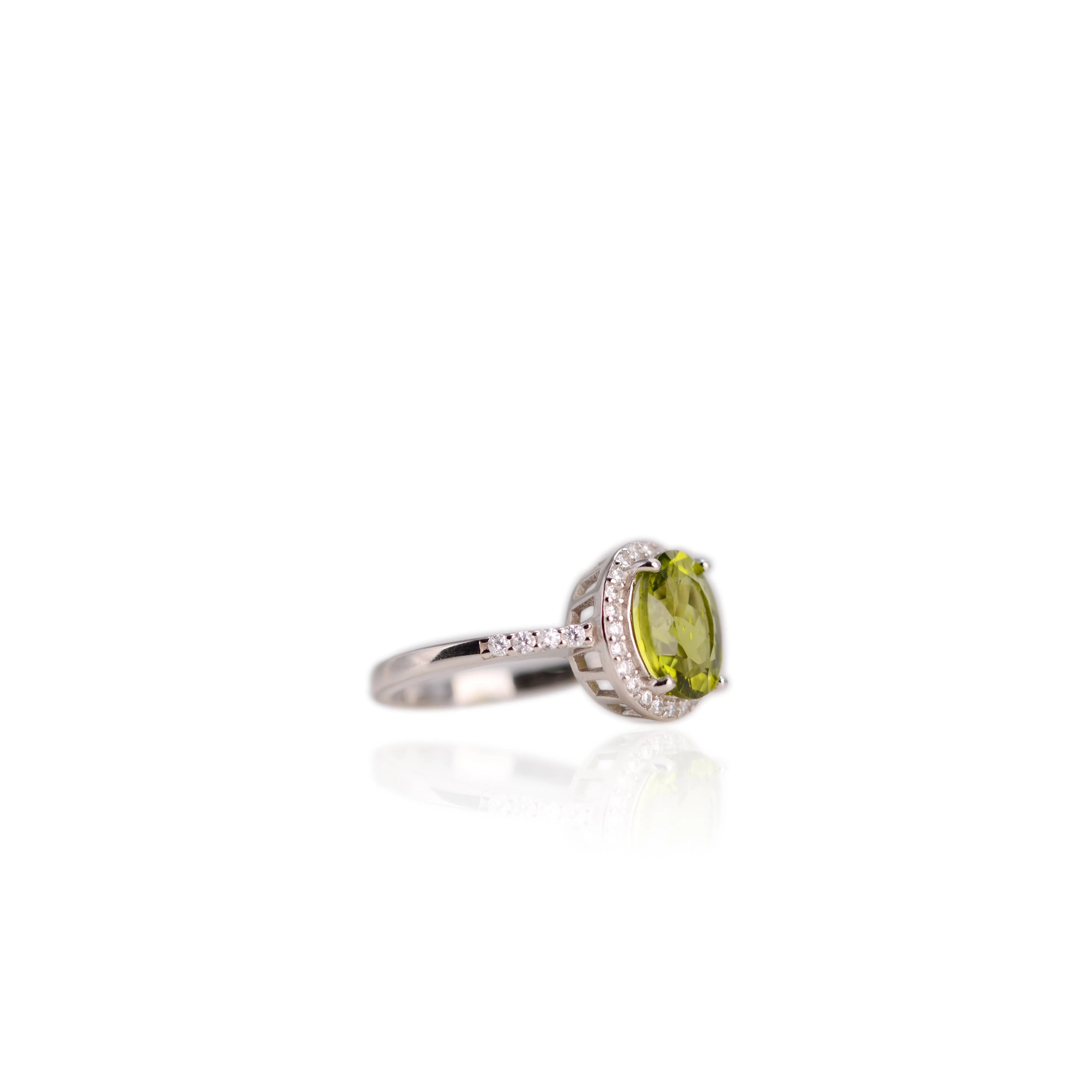 8 x 10  mm. Oval and Checkerboard Cut Green Pakistani Peridot with Cz Halo Ring