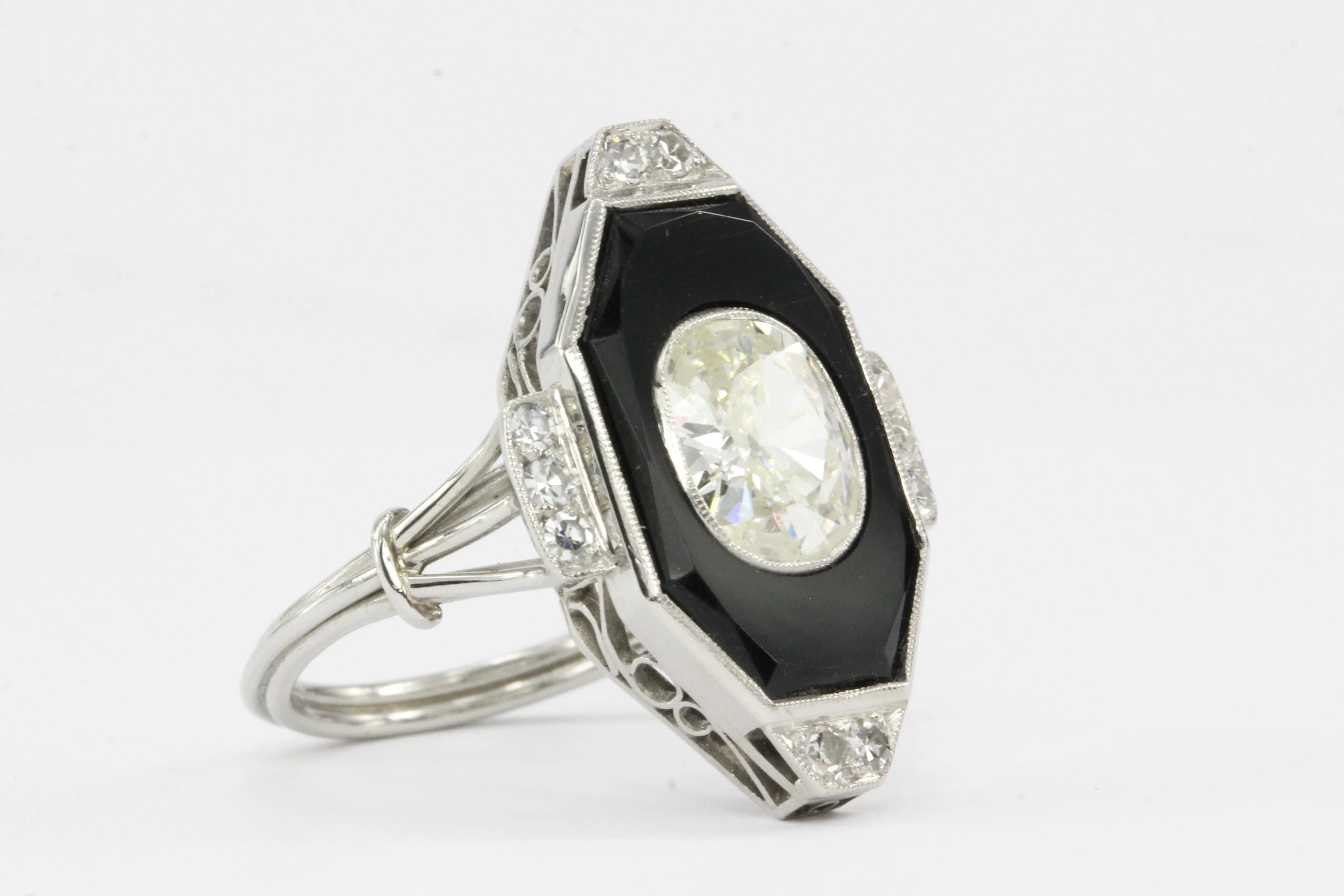 Art Deco Platinum Onyx and 1.3CT Oval Diamond Ring