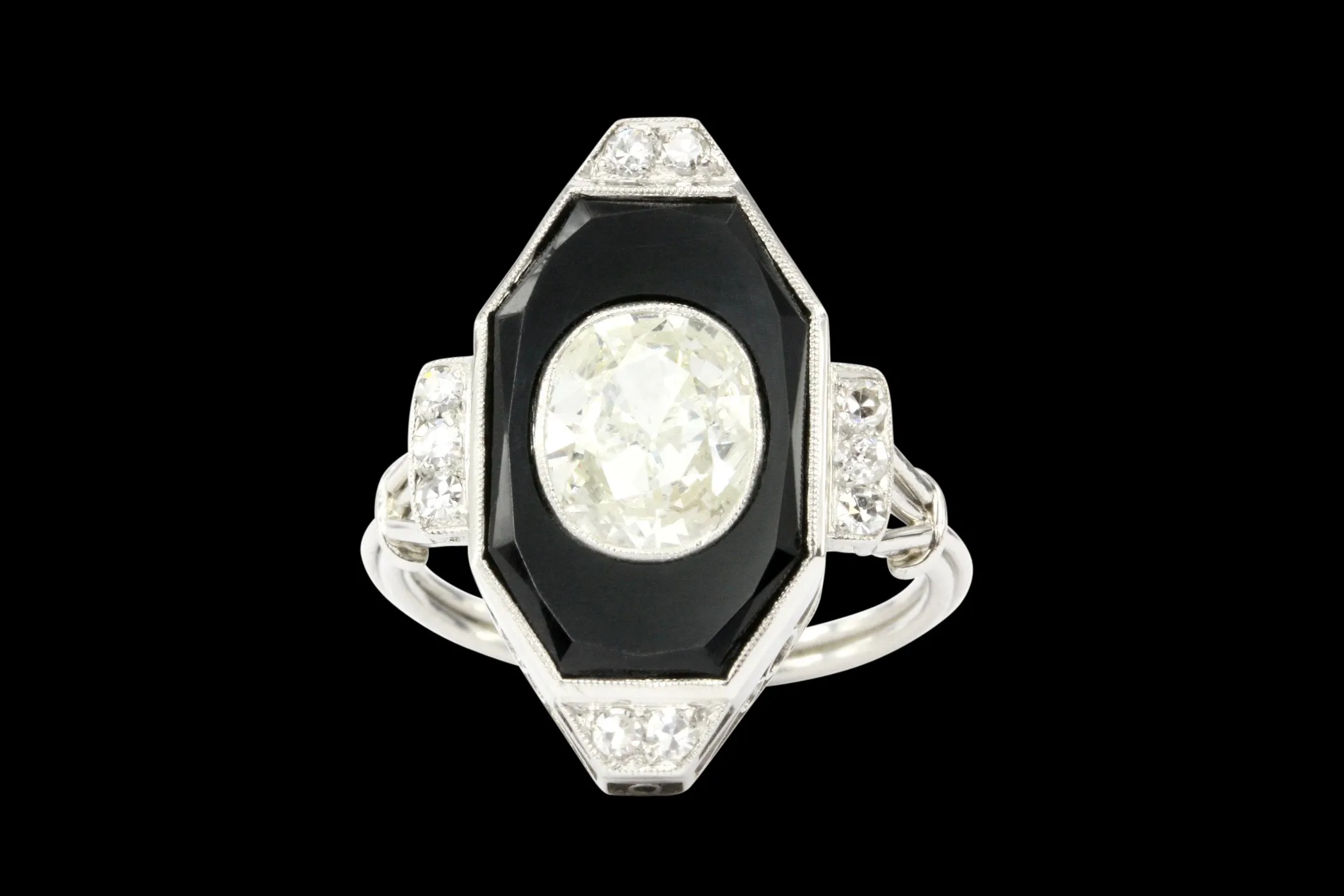 Art Deco Platinum Onyx and 1.3CT Oval Diamond Ring