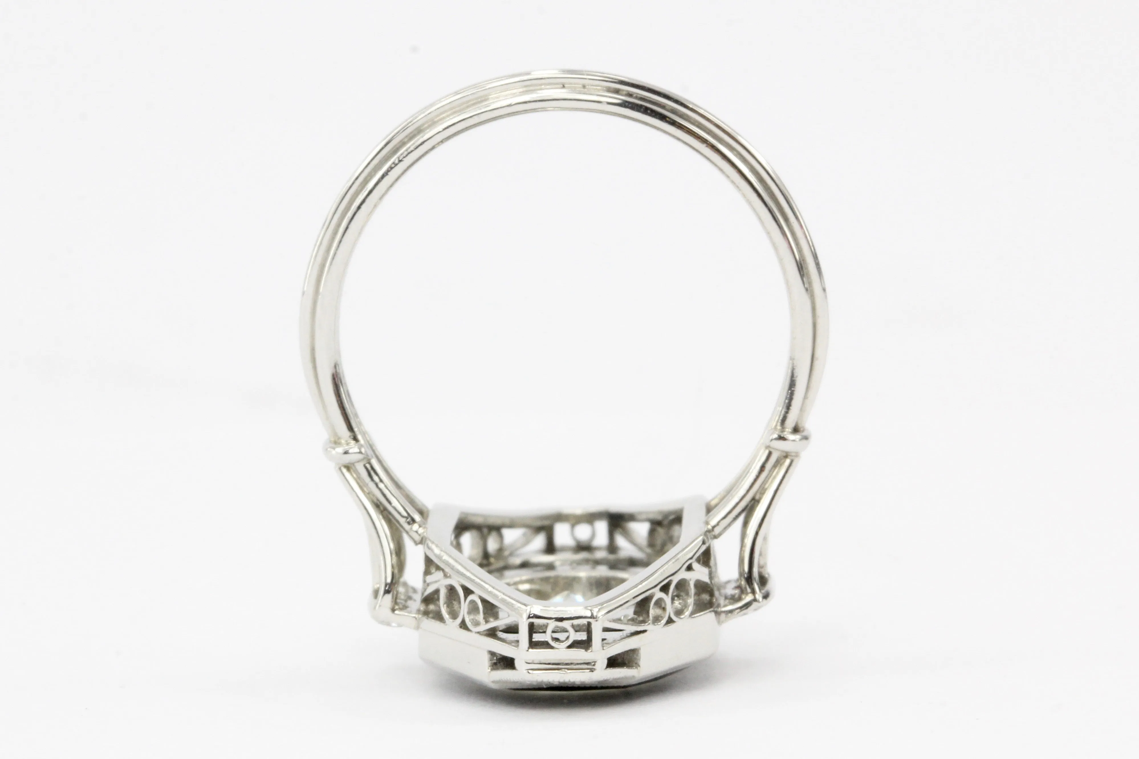Art Deco Platinum Onyx and 1.3CT Oval Diamond Ring
