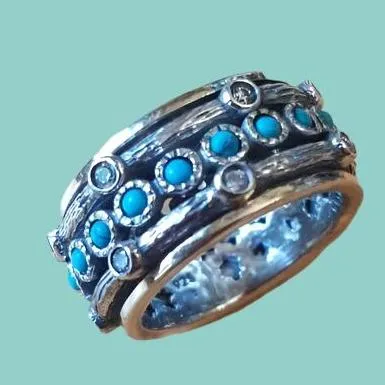 Bluenoemi Spinner Ring for woman set with gemstones