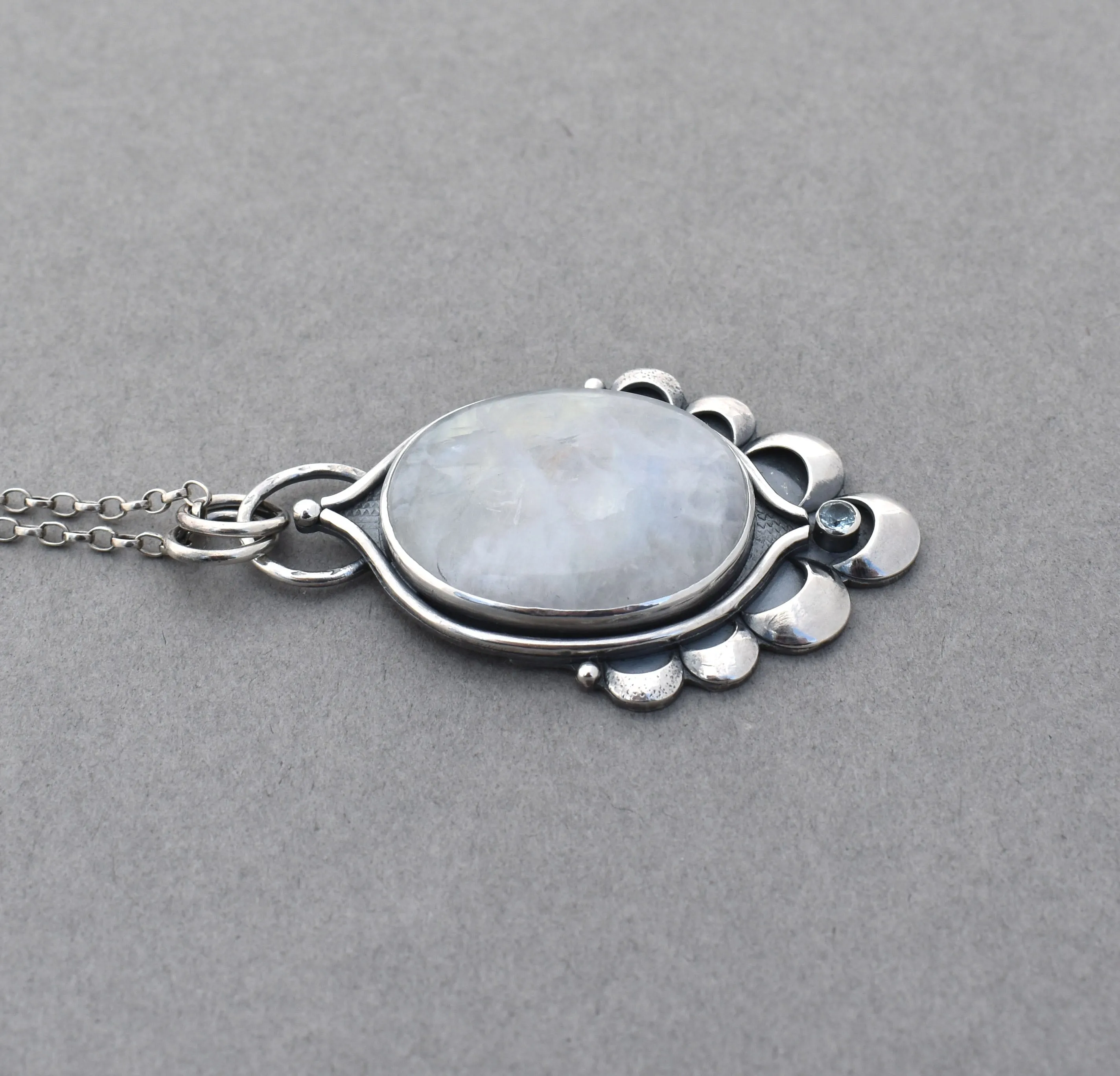 Moonstone Pendant with Crescent Accents.