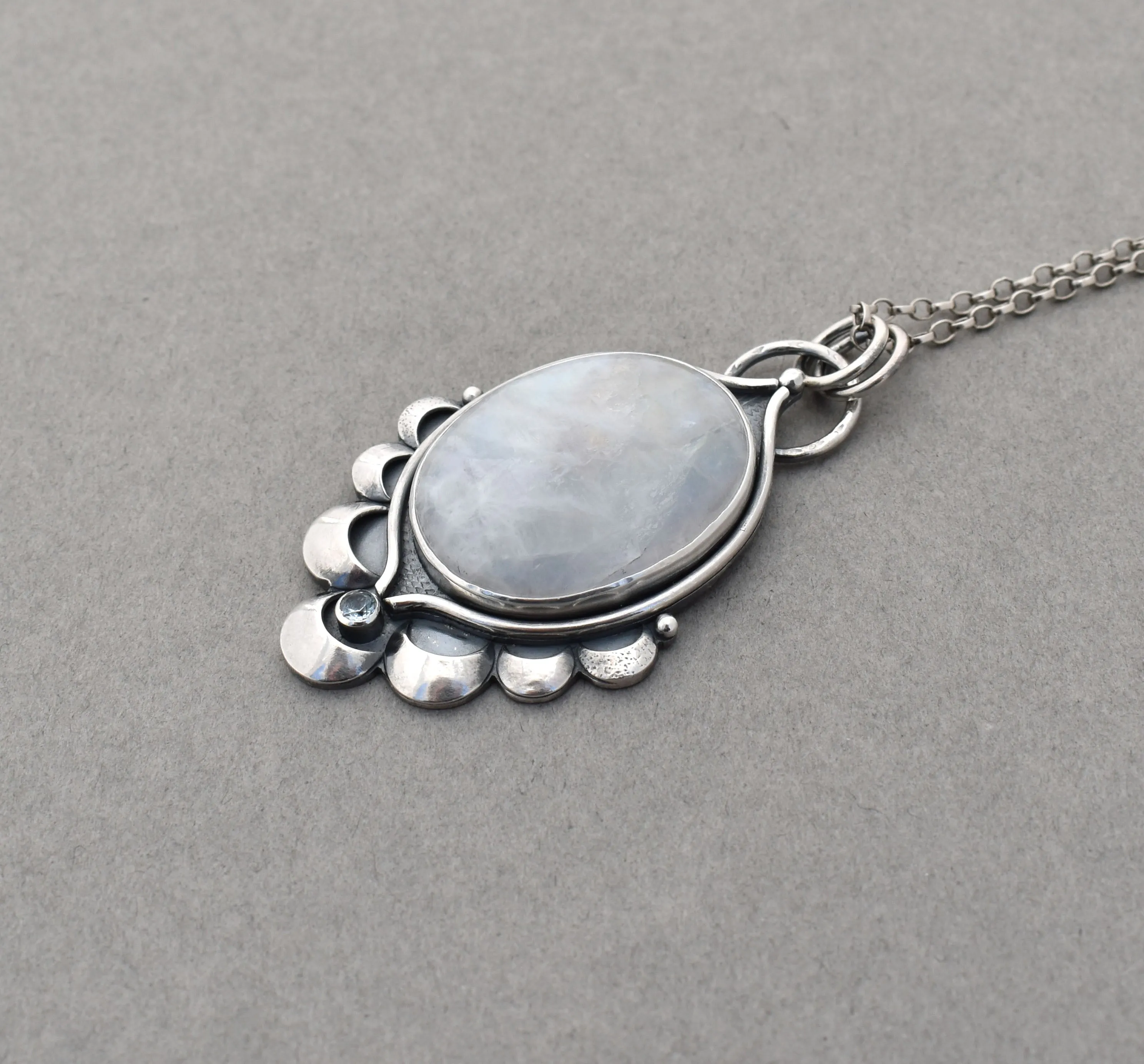 Moonstone Pendant with Crescent Accents.