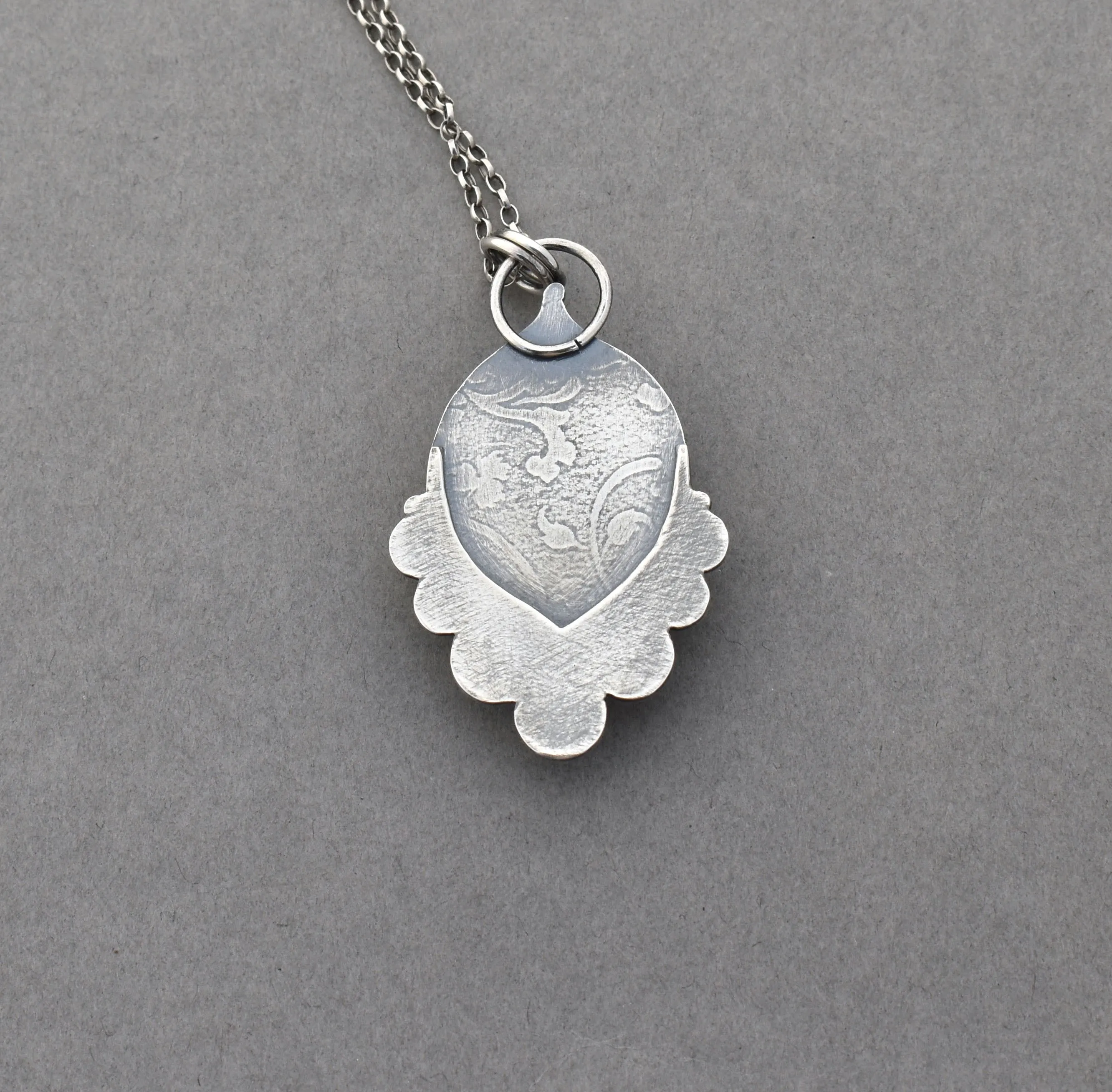 Moonstone Pendant with Crescent Accents.