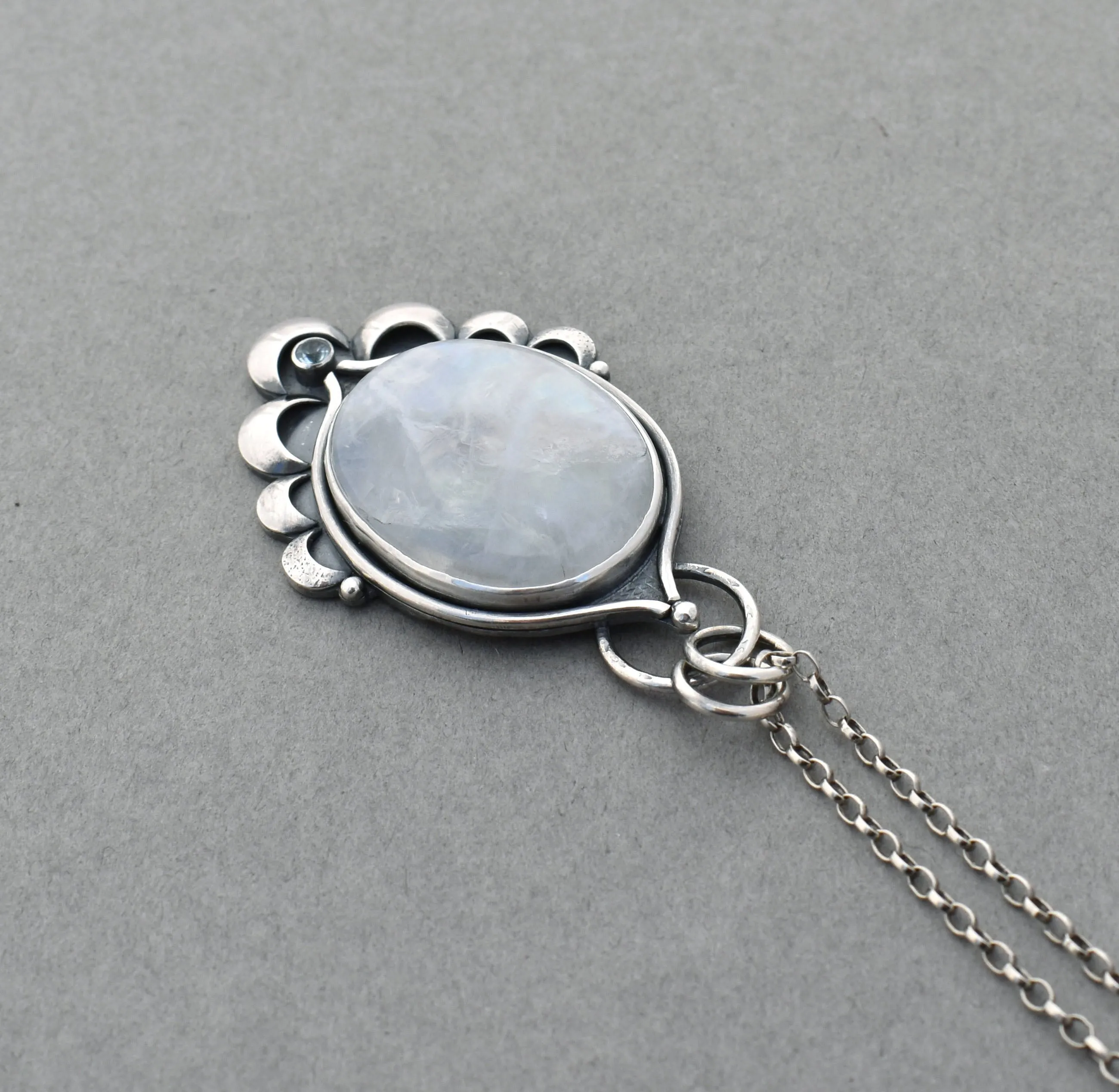 Moonstone Pendant with Crescent Accents.