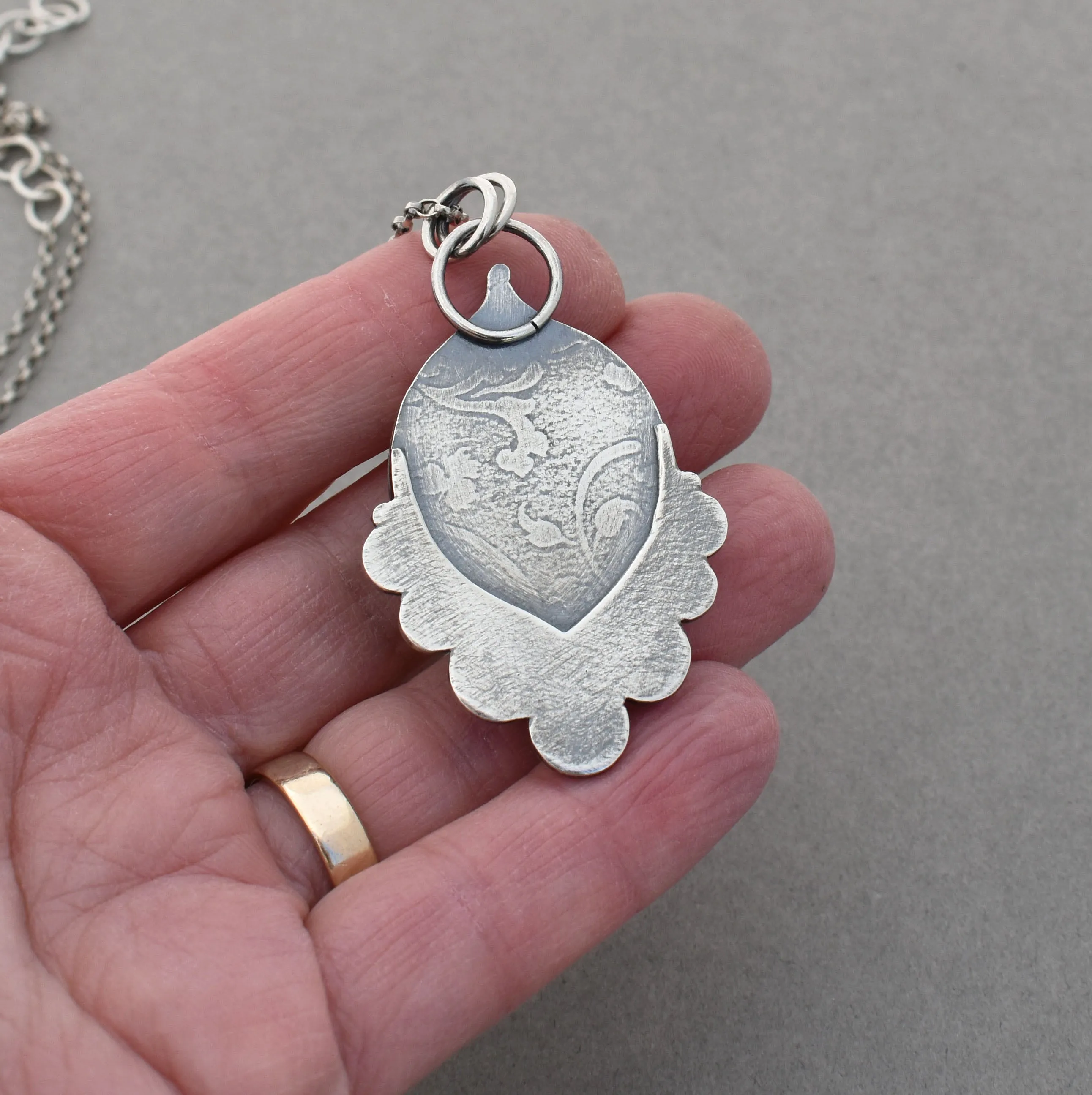 Moonstone Pendant with Crescent Accents.